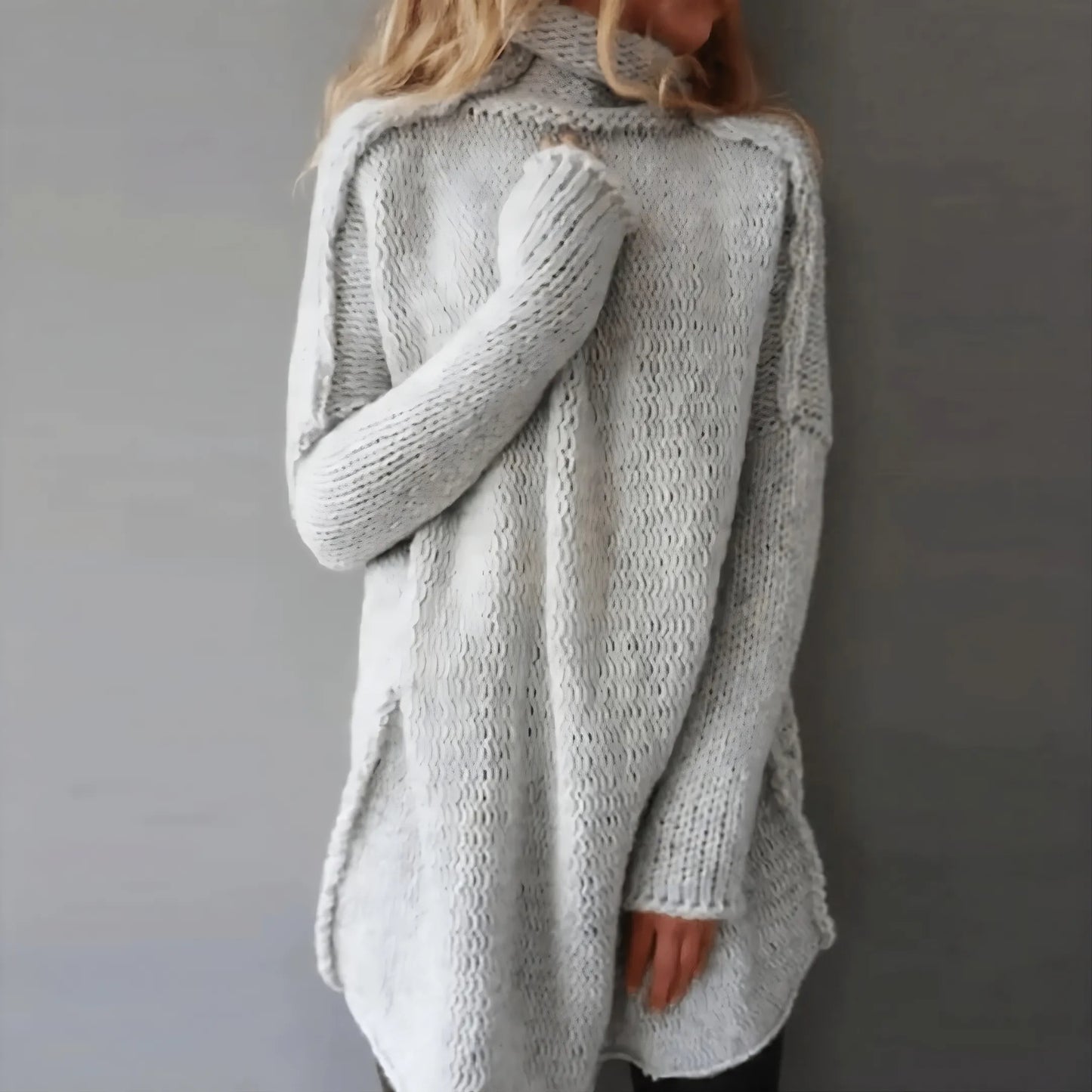 Women's hand-knit cable sweater