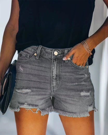 Mid-rise ripped denim shorts