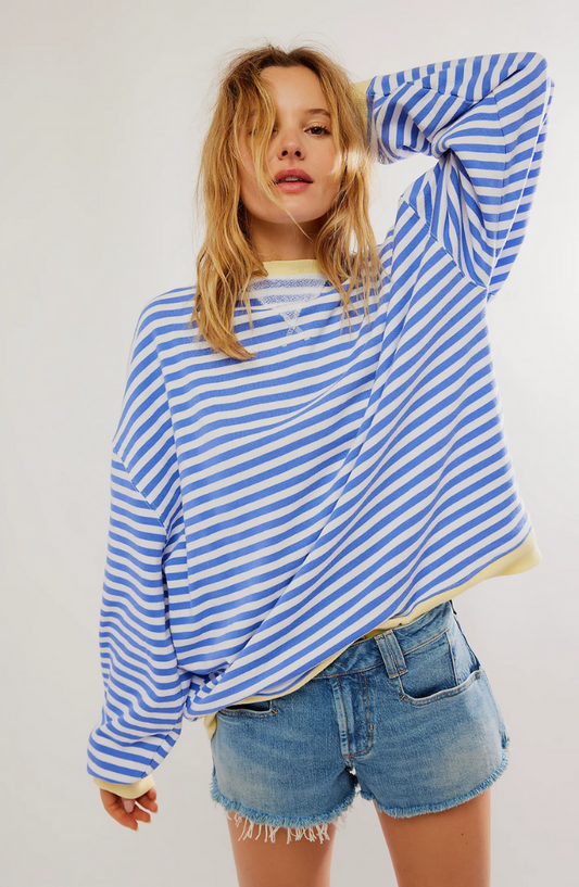 Women's sweaters with too-large stripes