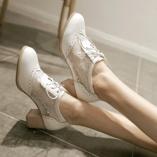 Classic lace-up shoes with mesh high heel