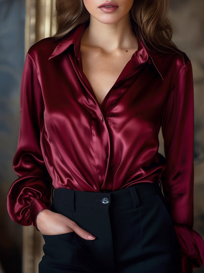 Elegant Black Satin Blouse with Long Sleeves