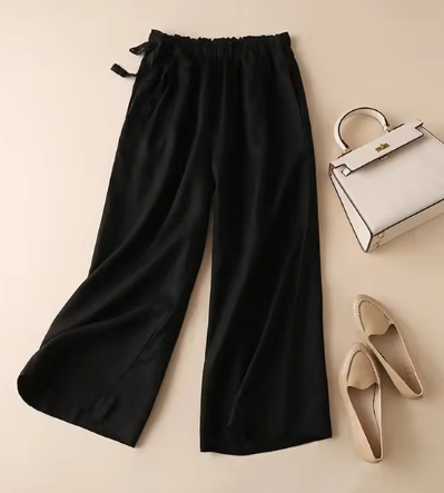 Verena - Straight leg pants with khaki bow and elasticated high waist.