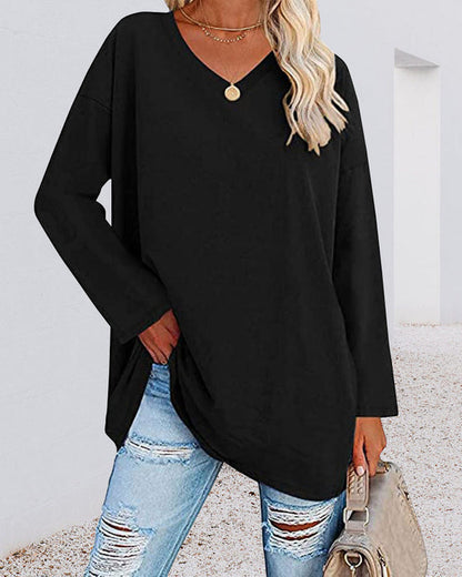 Plain-colored women's blouse with long sleeves and v-neckline