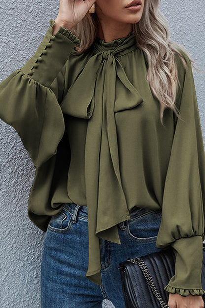 Mora - Fringed tie-neck blouse with episcopal sleeves