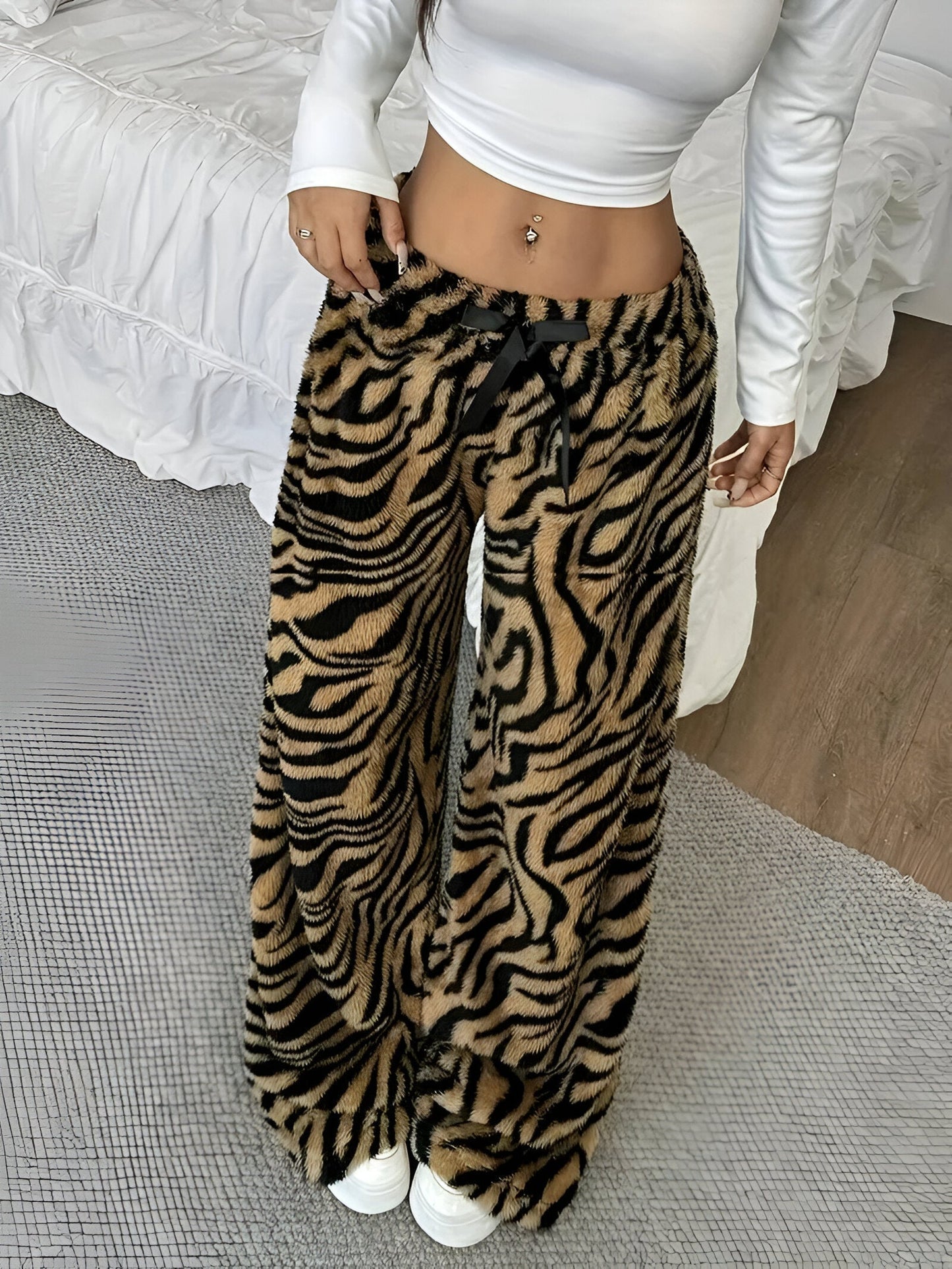 Hedvika | Elegant wide leg pants with zebra print for women