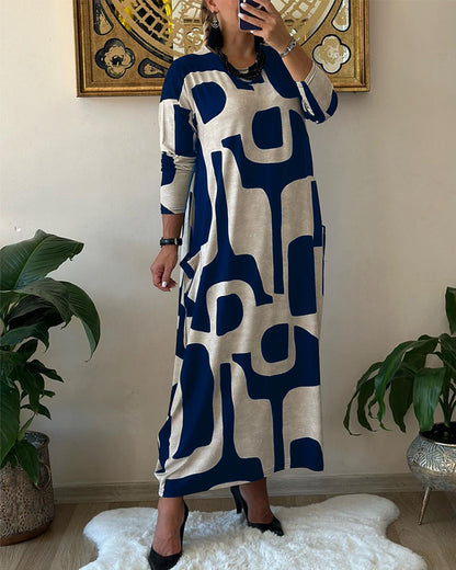 Long-sleeved dress with black and white print