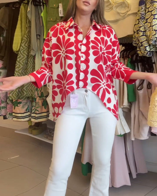 Blouse with flowers and lapels