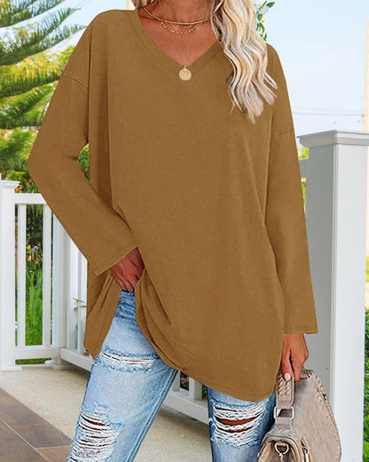 Plain-colored women's blouse with long sleeves and v-neckline