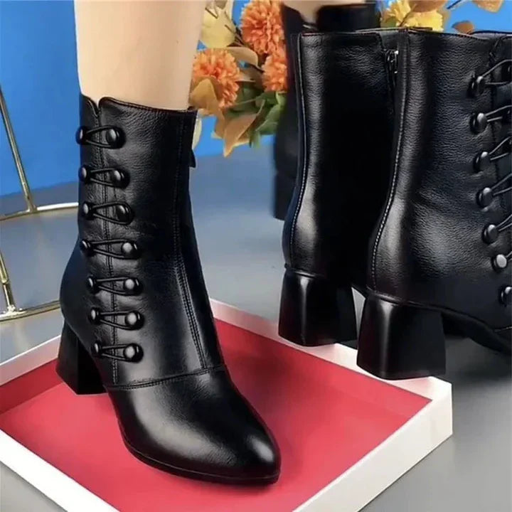 Warm women's boots made from coarse leather