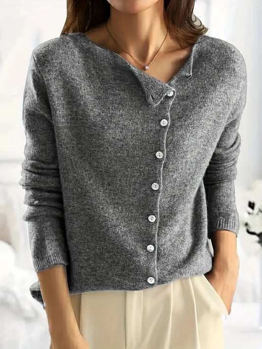 Plain asymmetric cardigan with button closure