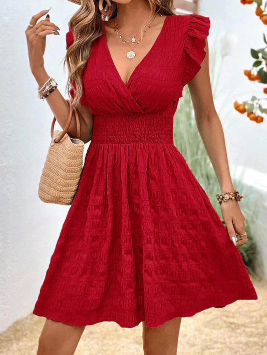 Carmelita - Casual dress with ruffled sleeves.