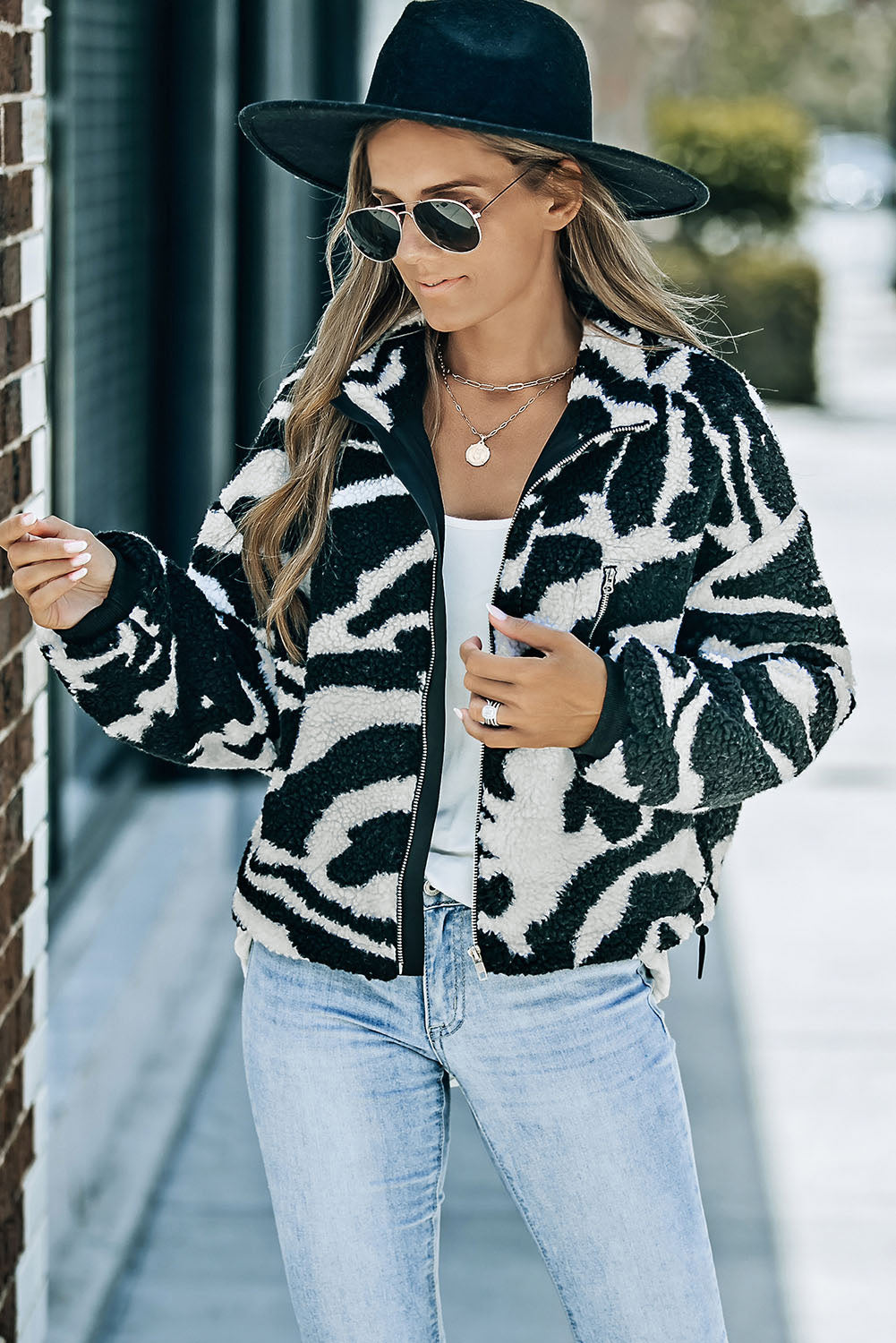 Chika | Playful plush jacket with zebra print