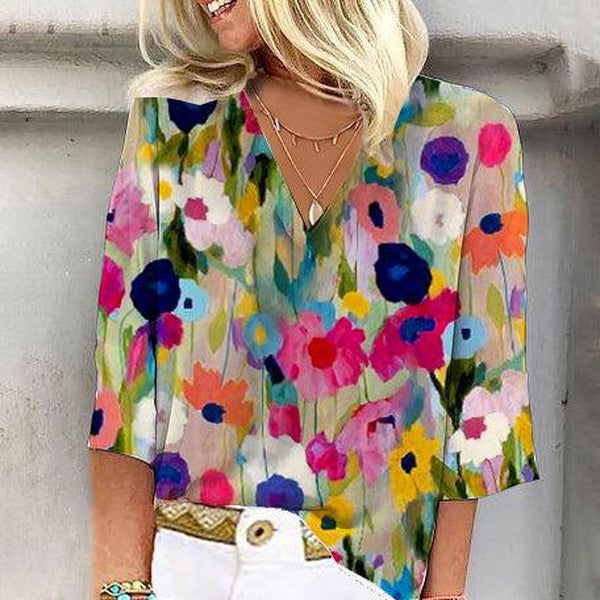 Romantic top with floral print and 3/4 sleeves