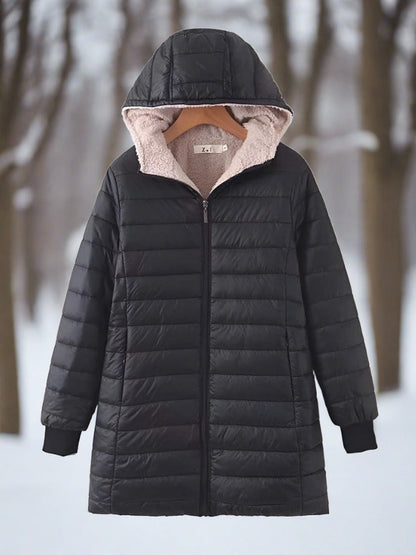 Apolline - Warm, long quilted winter jacket with hood