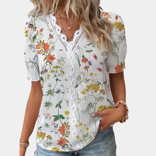 Zuzanna - Women's floral blouse with lace trim.