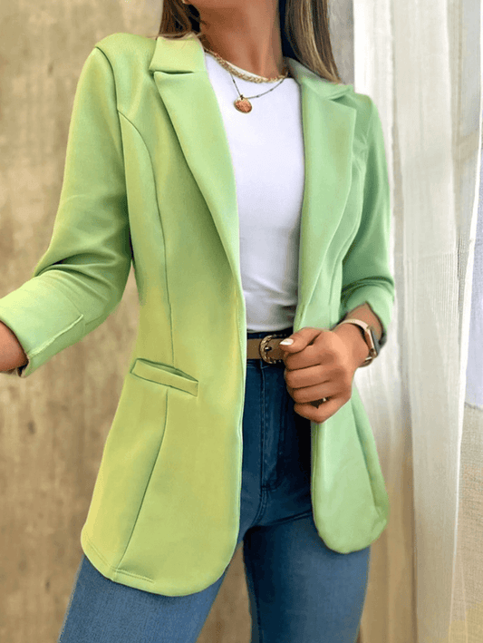 Single-colored office blazer, pockets, lapel collar, long sleeves, women's suit style, elegant fashion jacket