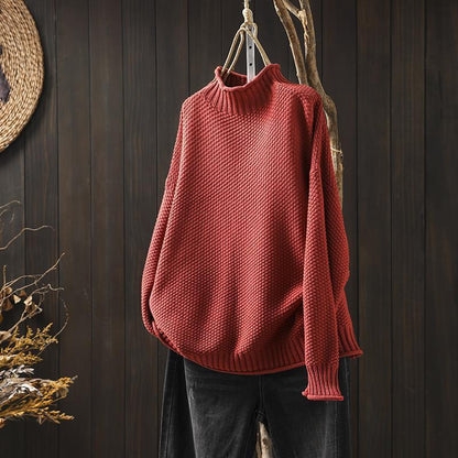 Knitted sweater with high neckline for women