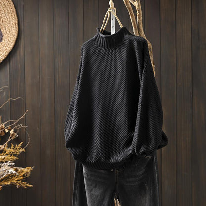 Knitted sweater with high neckline for women