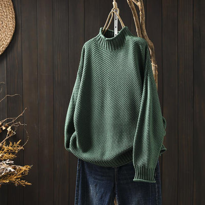 Knitted sweater with high neckline for women