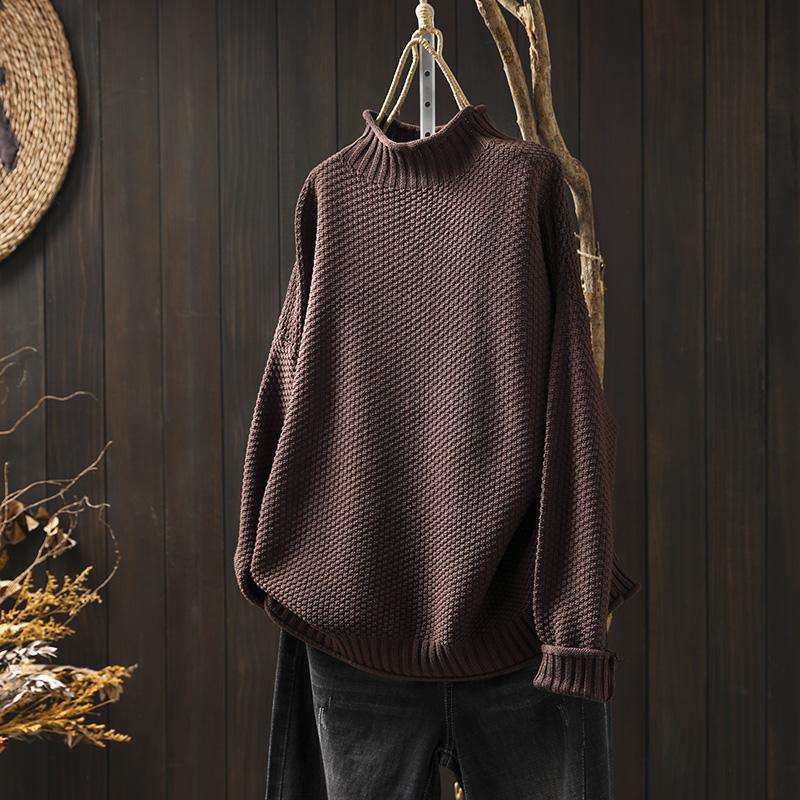 Knitted sweater with high neckline for women