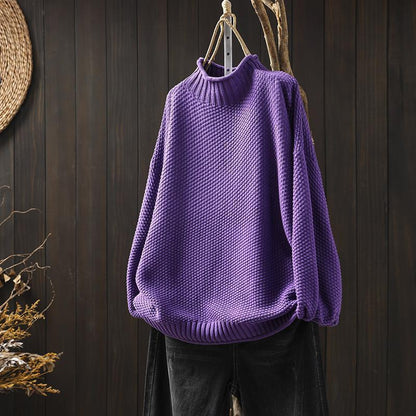 Knitted sweater with high neckline for women