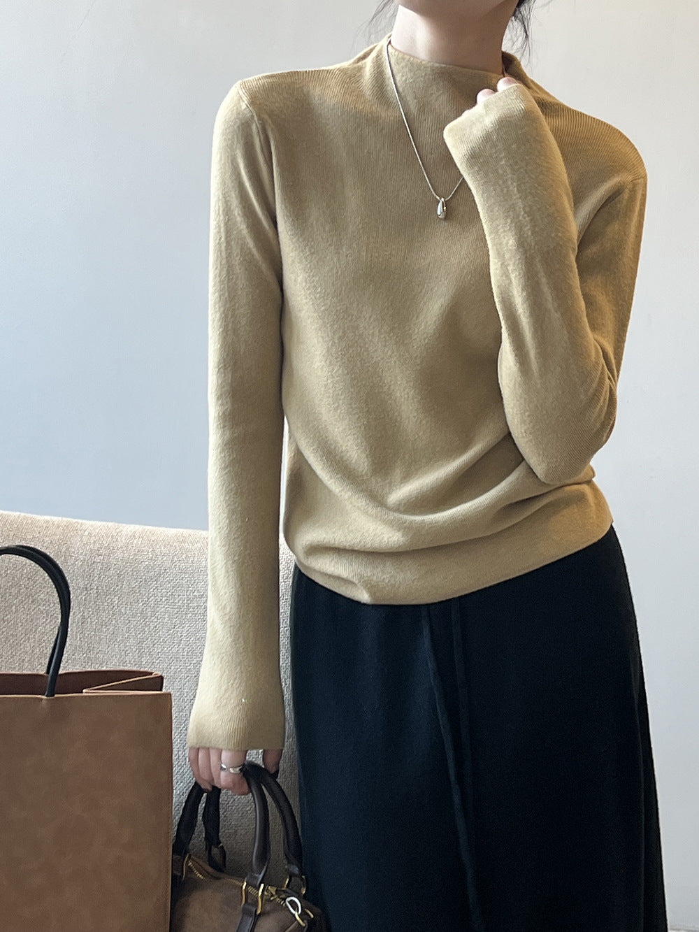 Women's half turtleneck sweater with soft texture