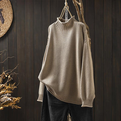 Knitted sweater with high neckline for women