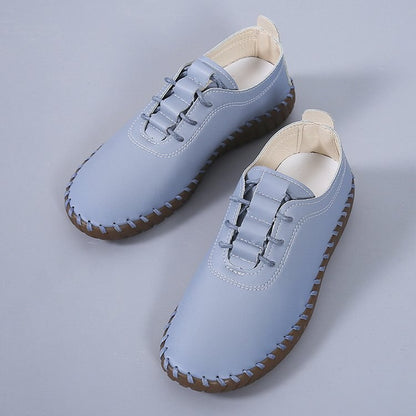 Women's soft leather hollow lace up flat shoes