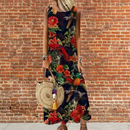 Matilda - Long dress with round neckline and floral pattern.