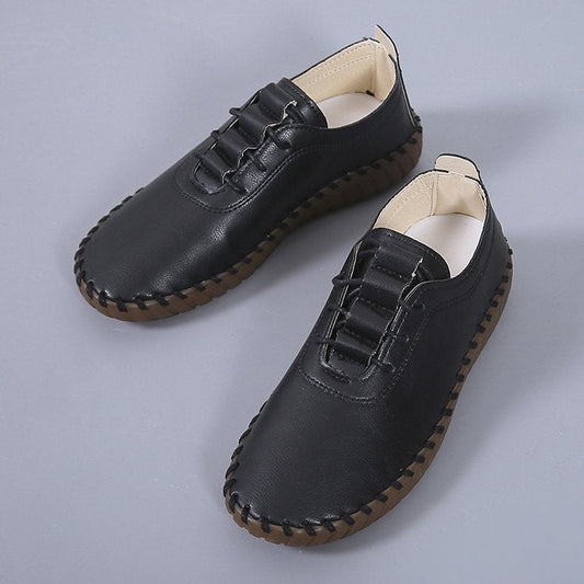 Women's soft leather hollow lace up flat shoes