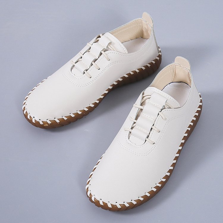 Women's soft leather hollow lace up flat shoes