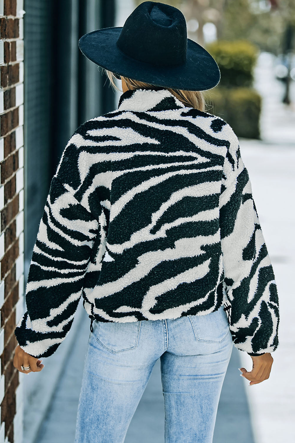 Chika | Playful plush jacket with zebra print