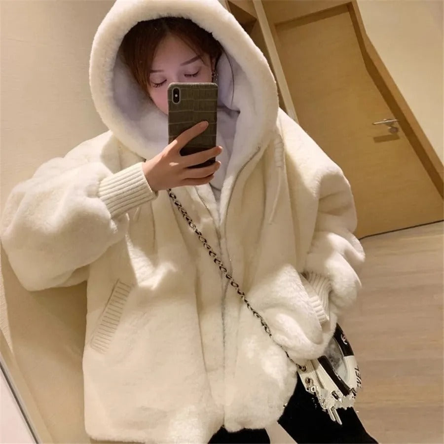 Women's oversized white fur coat