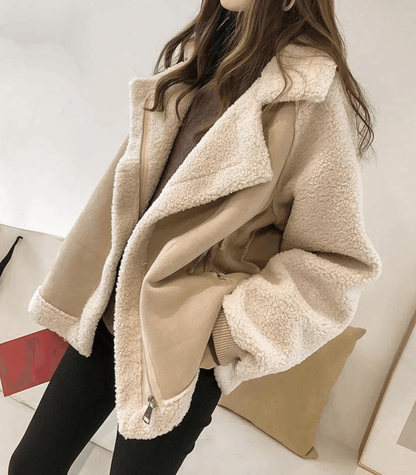 Chic, cozy, stylish teddy winter jacket made of faux lambskin for women